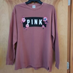 Pink brand top